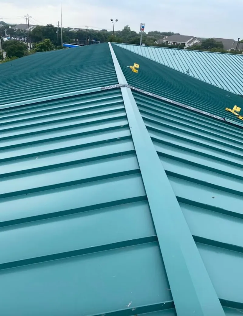 Green commercial metal roof ridge and valley for Metal Roof Repair in Valley Falls